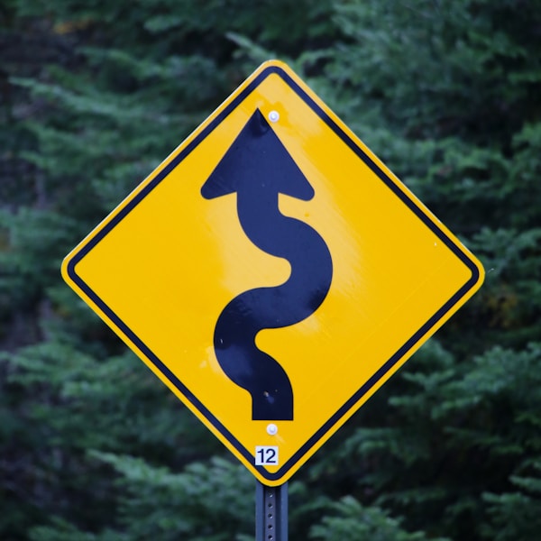 A winding road sign representing strategic direction